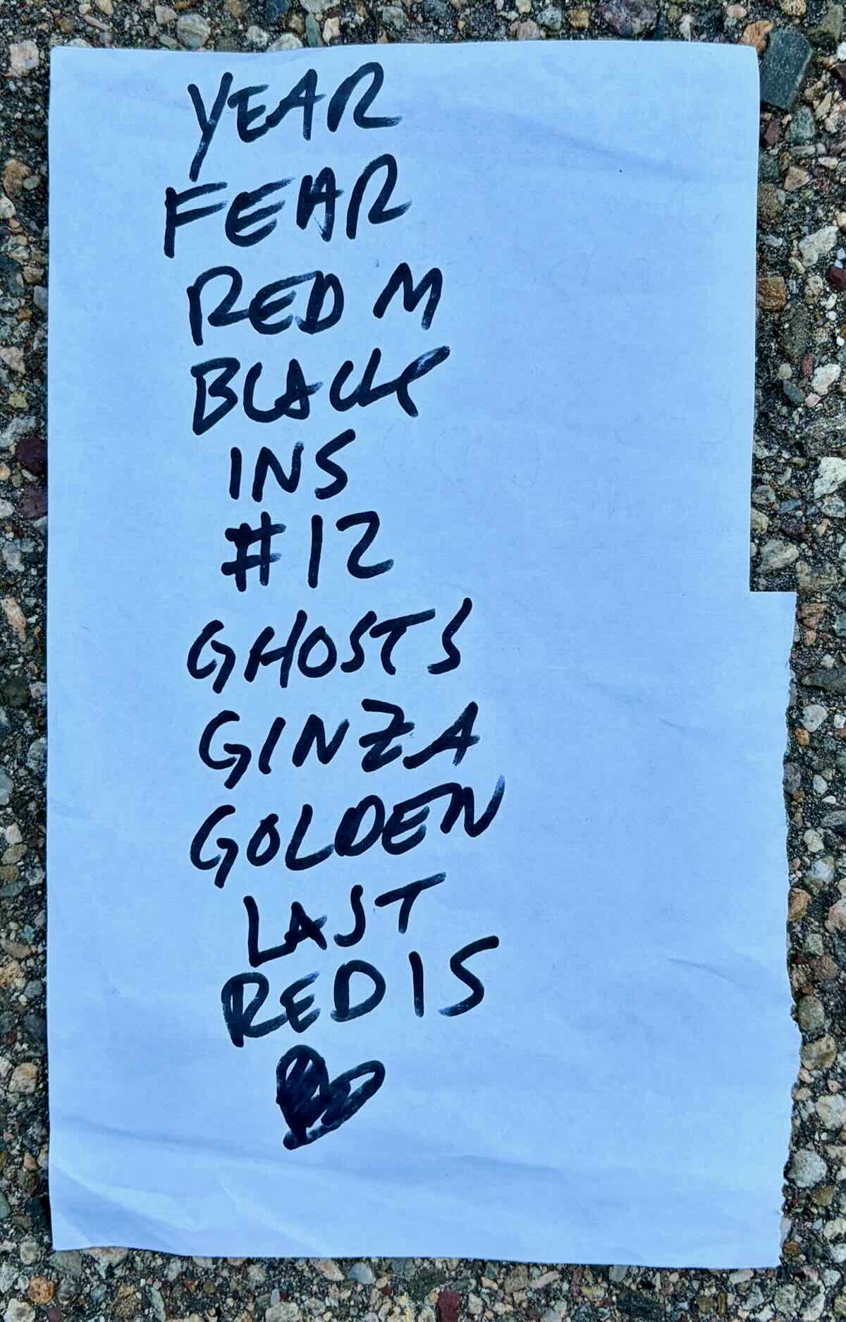 Handwritten Hunchback setlist on blue paper